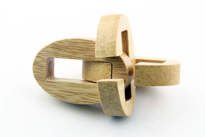small wooden c.o.c puzzle